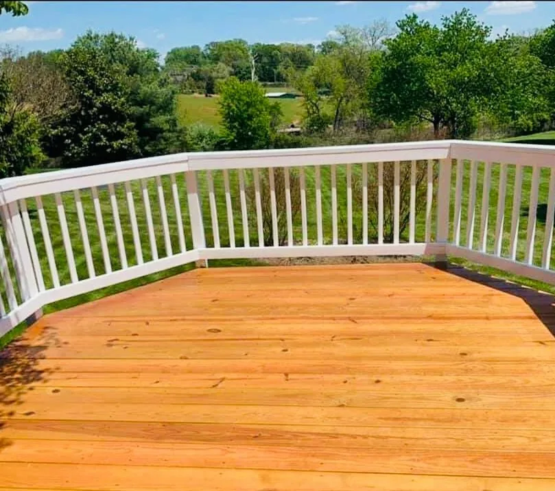 Cedar deck and white railing restored